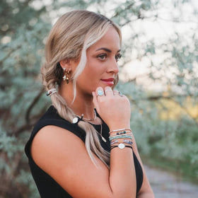 K'lani Flourish Hair Tie Bracelets displayed in elegant packaging