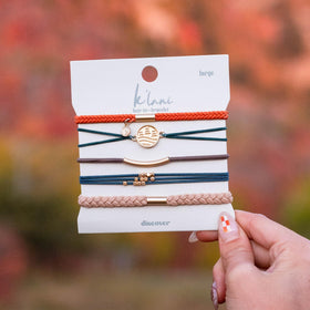 K'lani hair tie bracelet displayed on a flat surface