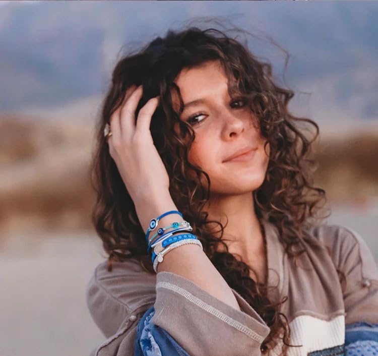 K'lani hair tie bracelet worn by a model in a casual setting