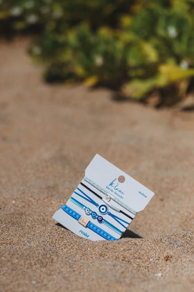 K'lani hair tie bracelets displayed in packaging, highlighting the colour coordination