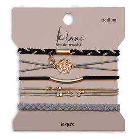 K'lani Inspire Hair Tie Bracelets in assorted colours on a wrist