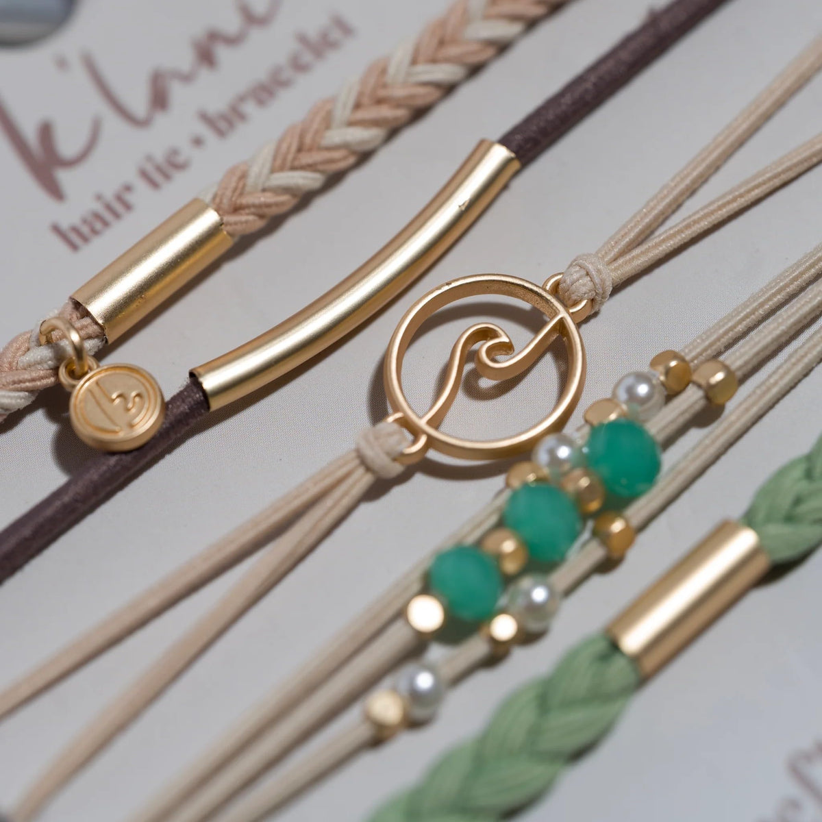 K'lani Reflect Hair Tie Bracelet worn on wrist showcasing boho style
