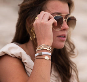 K'lani Rise Hair Tie Bracelets displayed in packaging