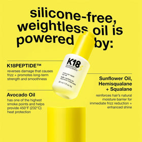 K18 Molecular Repair Hair Oil on a vanity with flowers