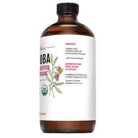 Kate Blanc Jojoba Oil displayed with other beauty products