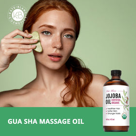 Kate Blanc Jojoba Oil on a wooden surface with natural elements