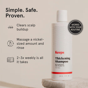 Keeps Thickening Shampoo for Men 8 Oz in a bathroom setting