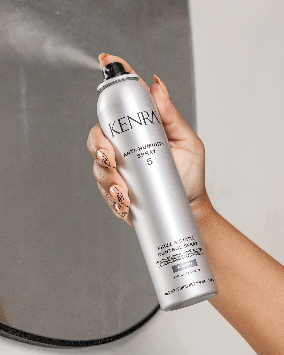 Kenra Anti-Humidity Spray 5 with hair styling tools