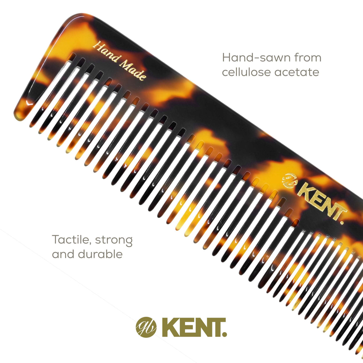 KENT 16T Hair Comb held in hand for scale
