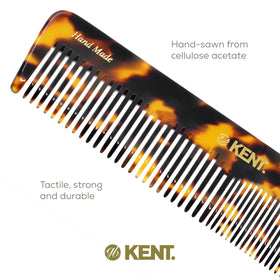 KENT 16T Hair Comb held in hand for scale