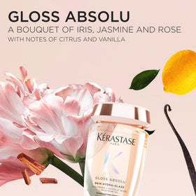 KÉRASTASE Gloss Absolu Shampoo with floral background