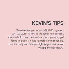KEVIN.MURPHY ANTI.GRAVITY.SPRAY in hand demonstrating usage
