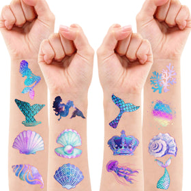Kids showing off their mermaid tattoos