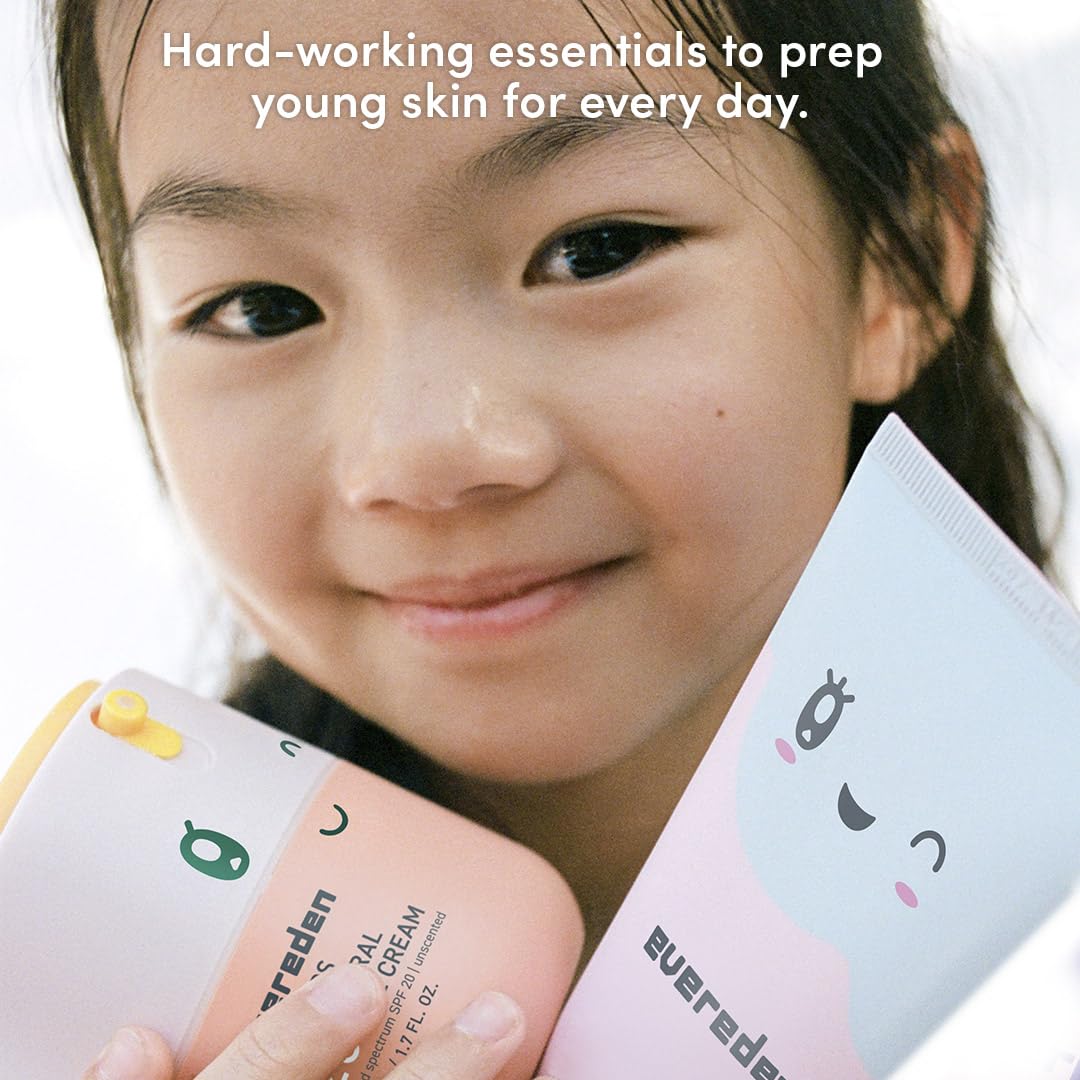 Kids using Evereden skincare products in a bathroom setting