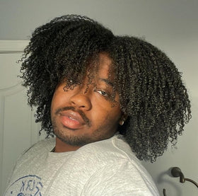 Kinky Curly Come Clean Shampoo in a lifestyle setting
