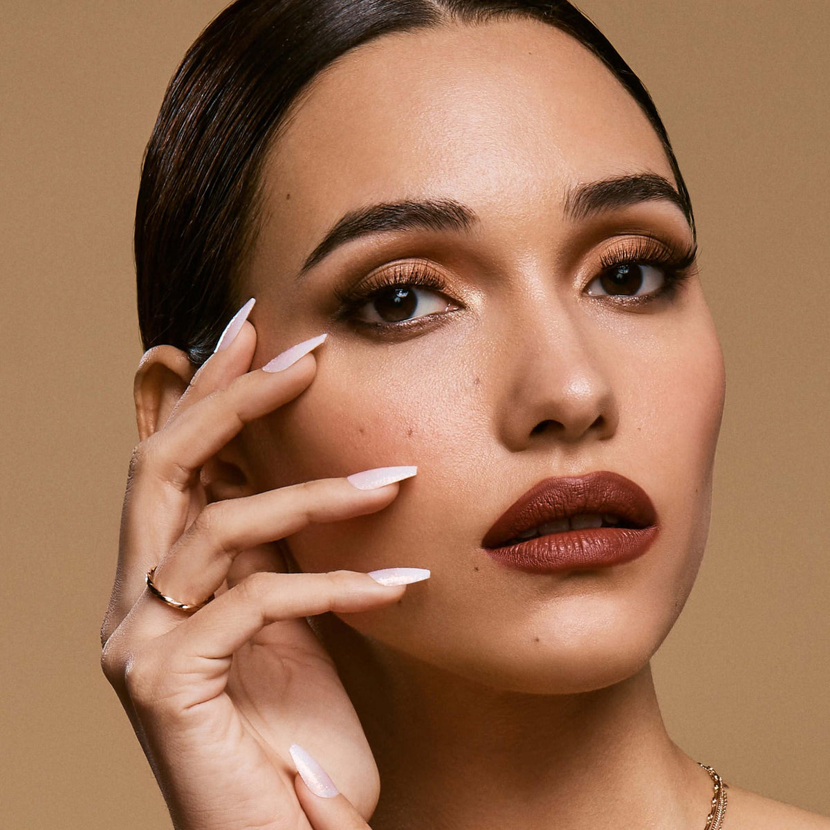 KISS Classy French nails displayed on a hand
