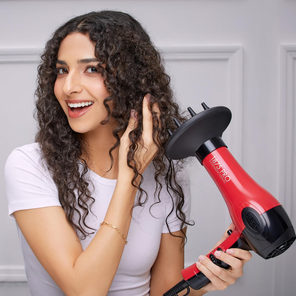 KISS hair dryer with accessories including diffuser and combs