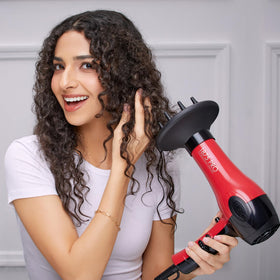 KISS hair dryer with accessories including diffuser and combs
