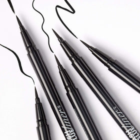 KISS Lash Glue Liner Black with false eyelashes