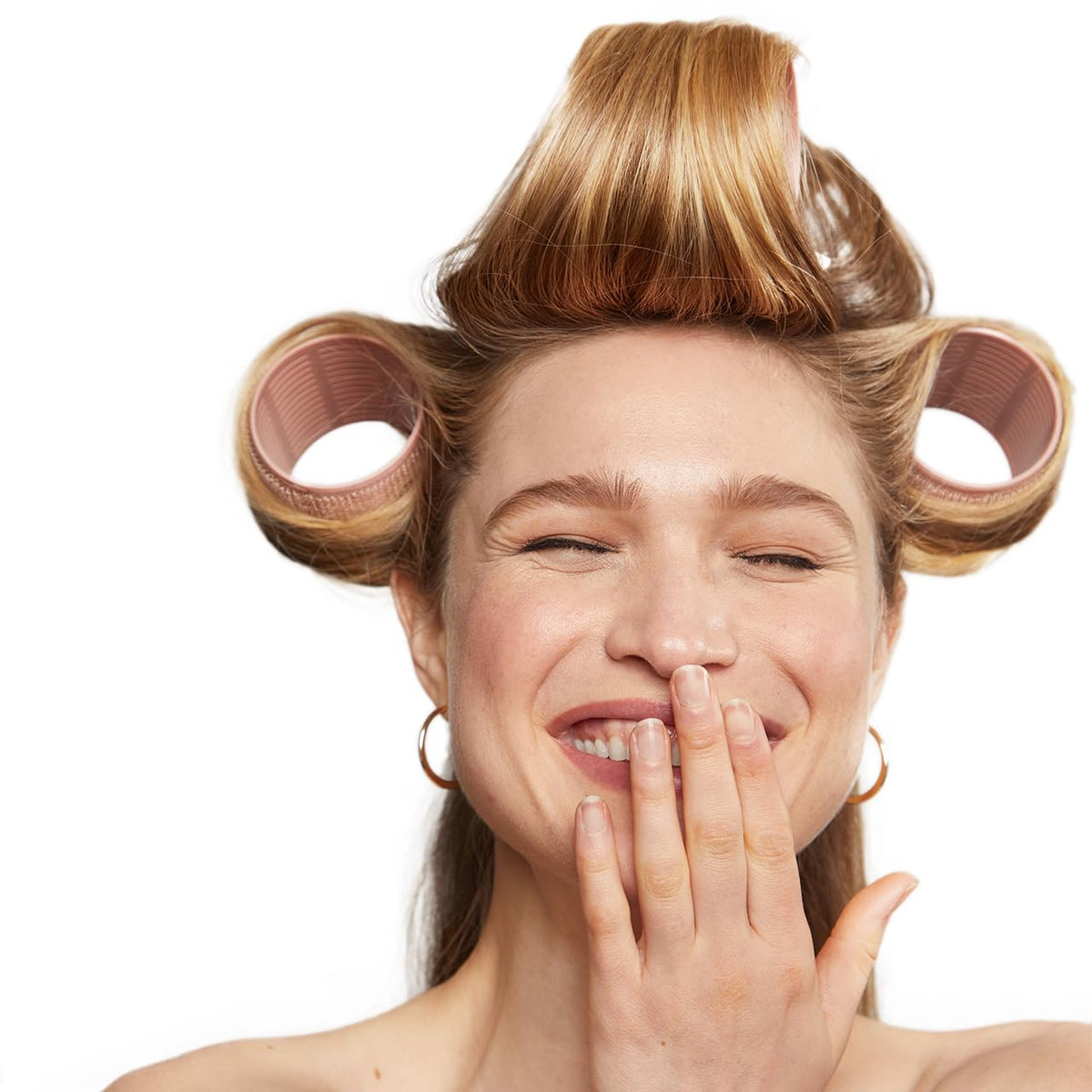 Kitsch Ceramic Hair Rollers in a bathroom setting