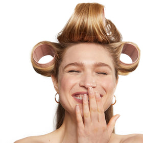 Kitsch Ceramic Hair Rollers in a bathroom setting
