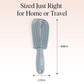 Kitsch Flexi Flow Detangler Brush in hand for styling