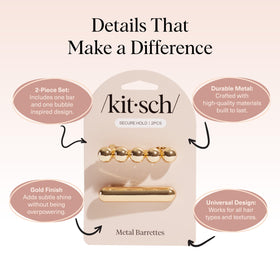 Kitsch Gold Hair Barrettes displayed on a flat surface