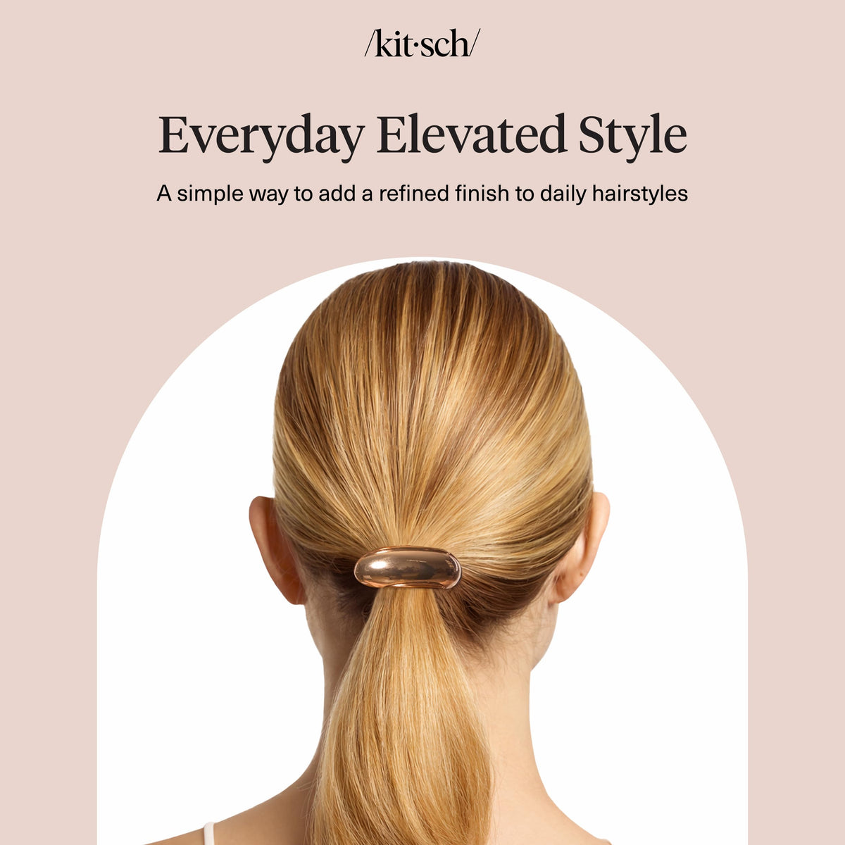 Kitsch Gold Hair Cuff alongside a fashion magazine