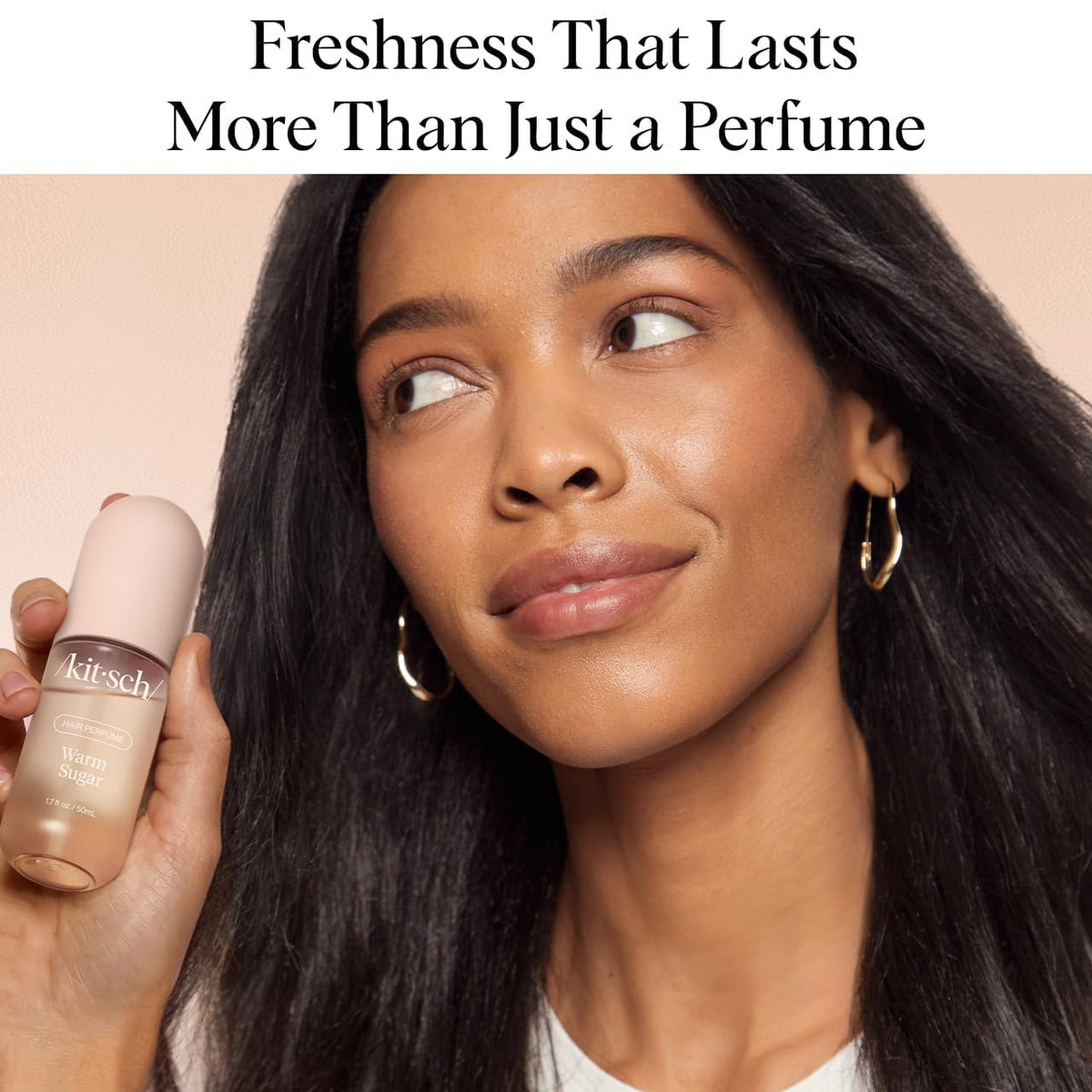 Kitsch Hair Perfume on a vanity with flowers