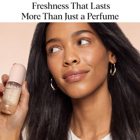 Kitsch Hair Perfume on a vanity with flowers