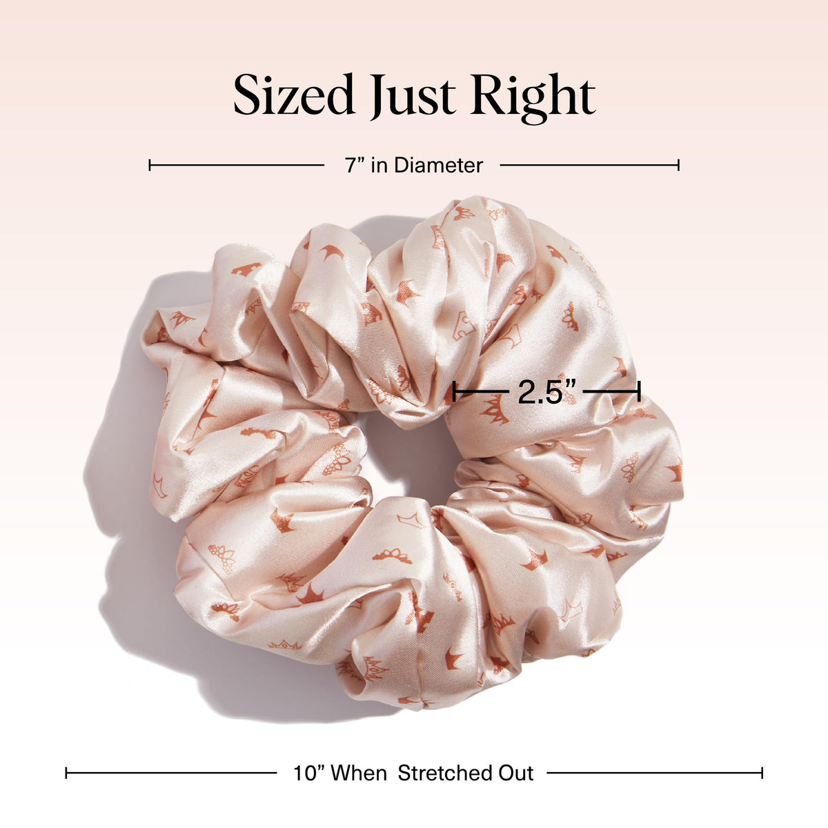 Kitsch satin scrunchies displayed on a soft surface