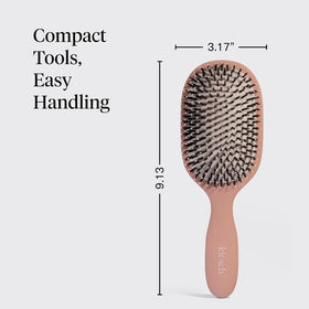Kitsch Smooth & Polish Hair Brush Terracotta on a bathroom counter