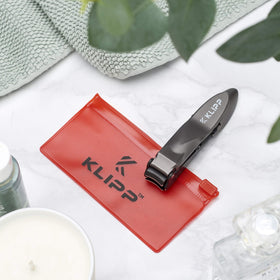 KLIPP Nail Clippers with nail trimmings in catch tray