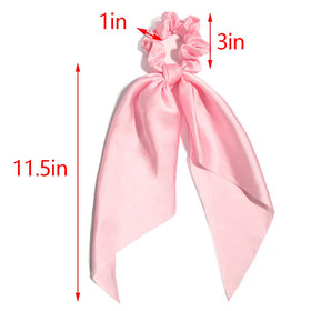 Knotted bow hair scrunchie in light pink with ribbon detail