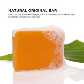 Kojie San Skin Lightening Soap 135g bar in bathroom setting