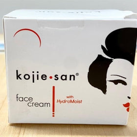 Kojie San Soap Bar in a lather with water droplets