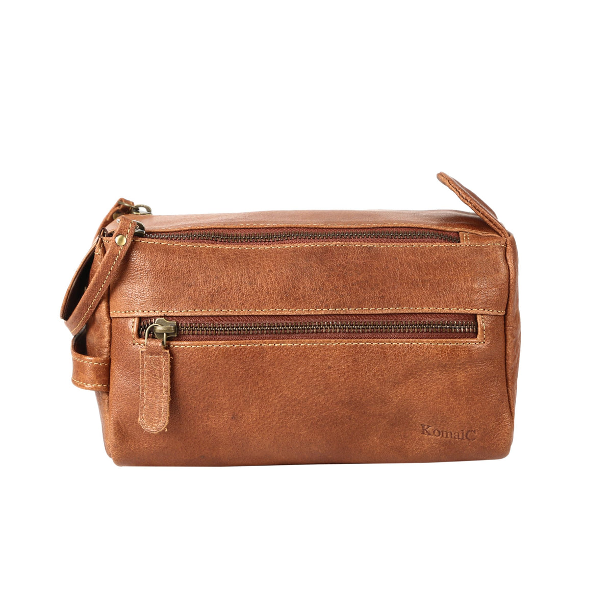 KomalC Toiletry Bag showing water-resistant interior lining