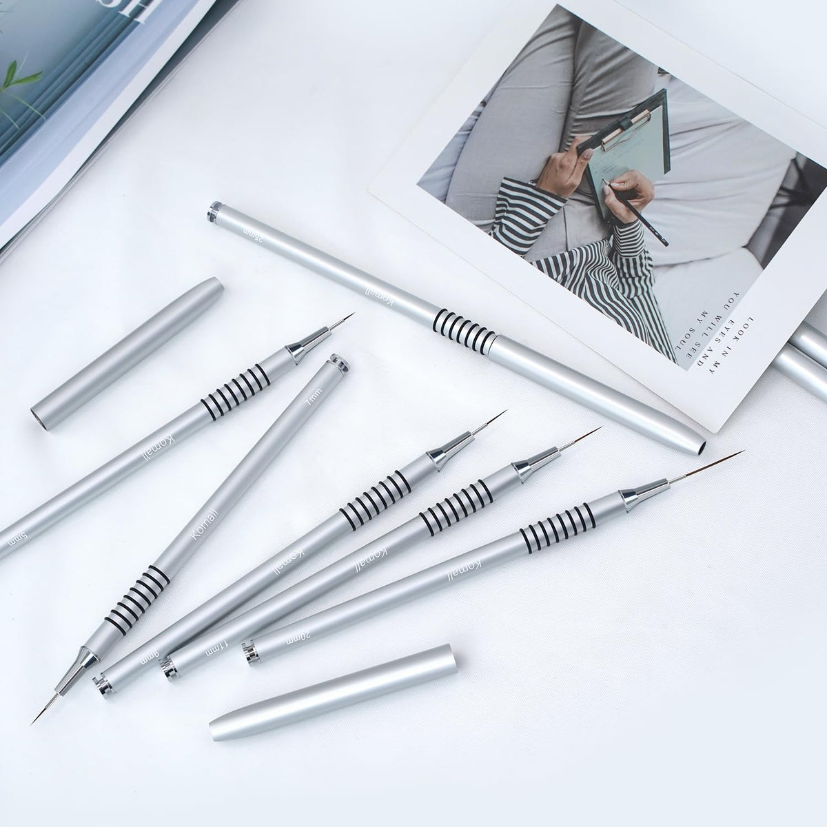 Komall Nail Art Brushes, showing metal ferrules