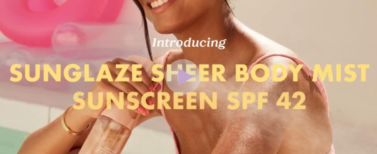 Kopari Rose Gold Sunglaze Sheer Body Mist SPF 42 with beach accessories