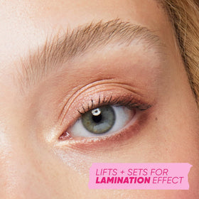 Kosas Air Brow Tinted Eyebrow Gel clear in hand