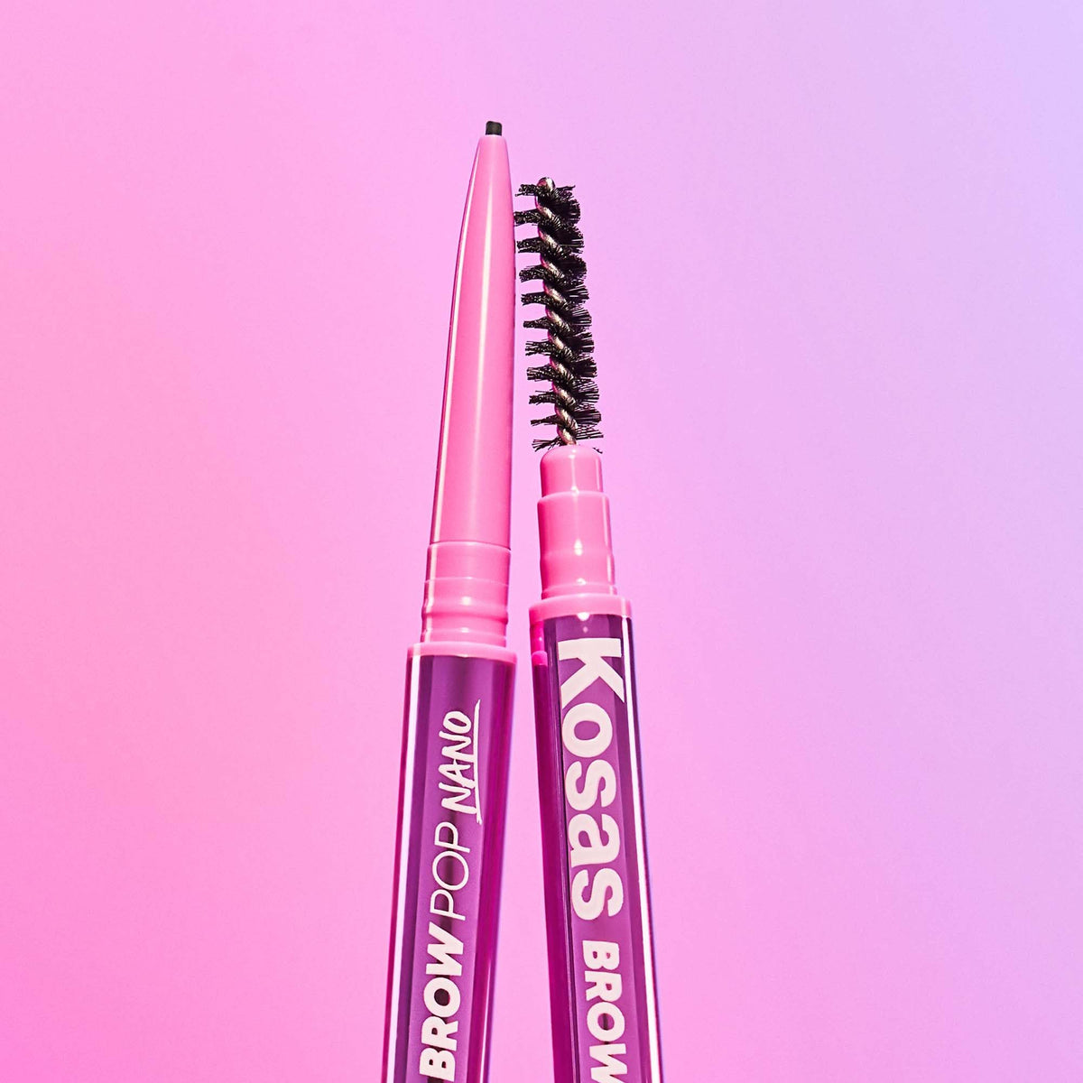Kosas Brow Pop Nano Ultra-Fine Eyebrow Pencil Taupe in hand