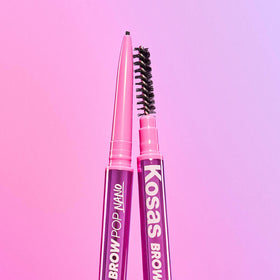 Kosas Brow Pop Nano Ultra-Fine Eyebrow Pencil Taupe in hand