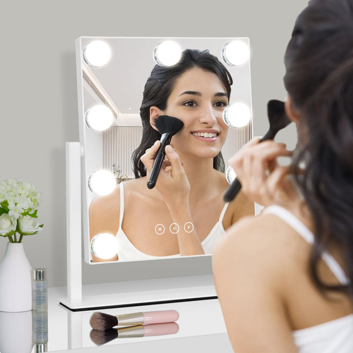 Kotdning Vanity Mirror with lights turned on in a makeup setup