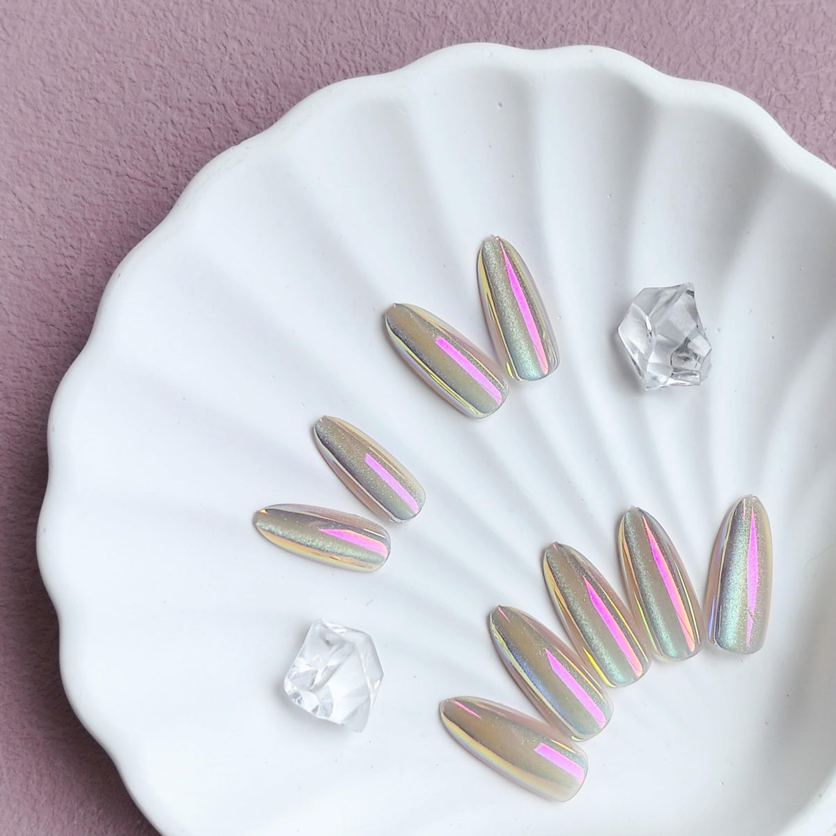 KQueenest press on nails in a decorative arrangement