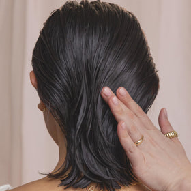 Kristin Ess Hair Weightless Shine Air Dry Cream lifestyle scene