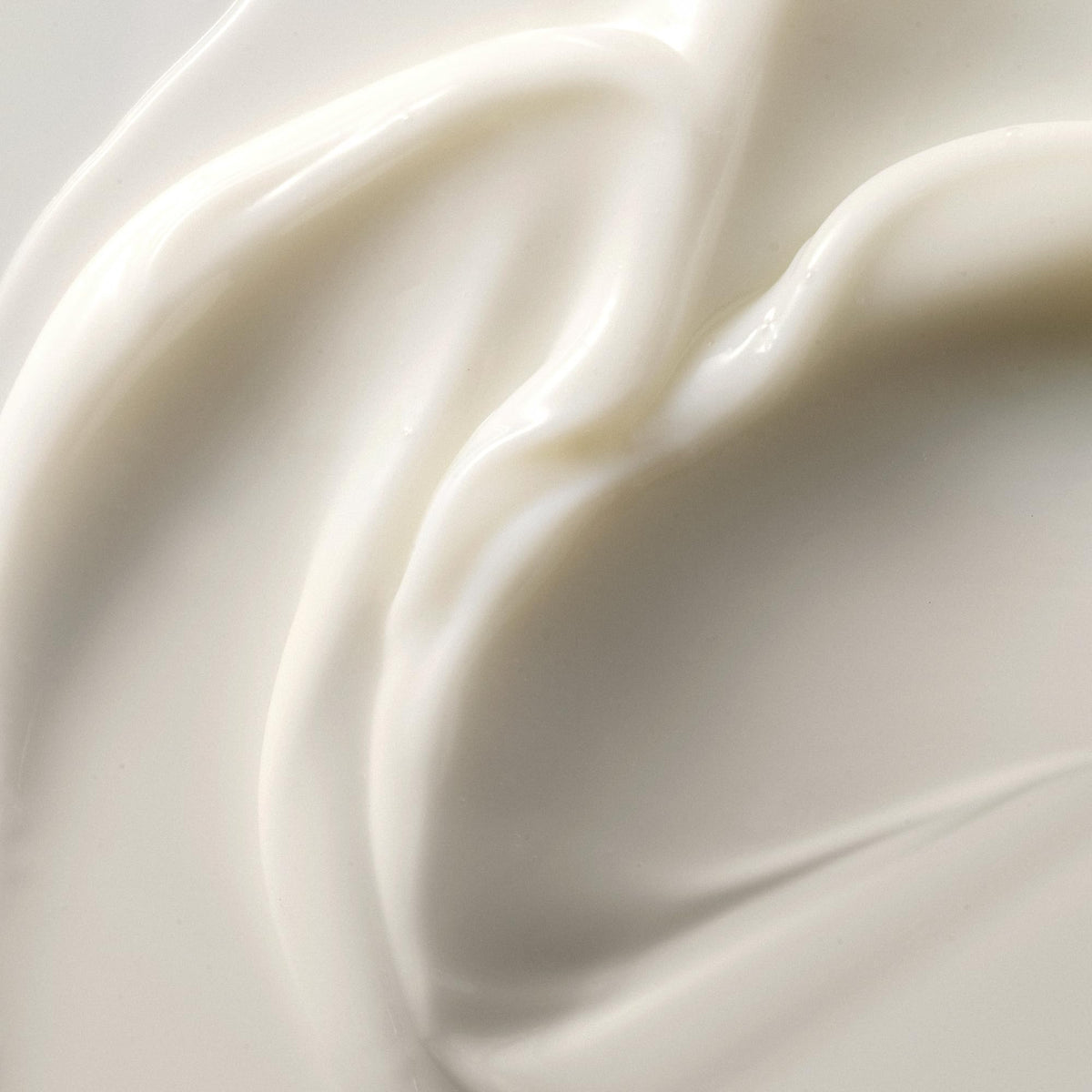Kristin Ess Hair Weightless Shine Air Dry Cream texture close-up