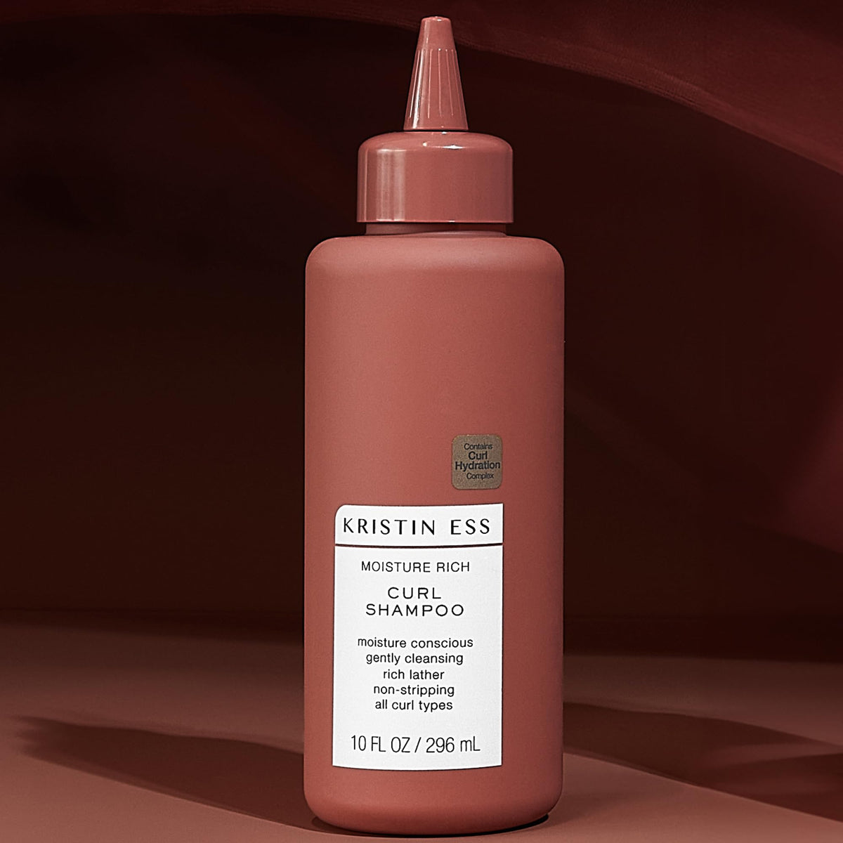 Kristin Ess Moisture Rich Curl Shampoo 10 fl oz with water droplets
