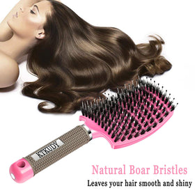 KTKUDY Detangling Brush demonstrating tangle removal