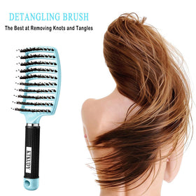 KTKUDY Detangling Brush in use on wet hair