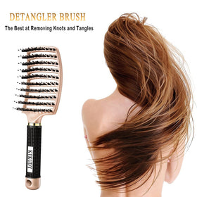 KTKUDY Detangling Brush in use on wet hair